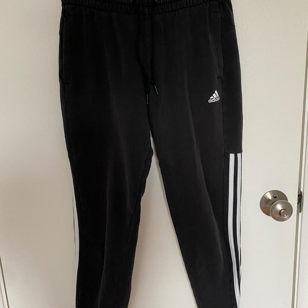 Black Adidas sweatpants
